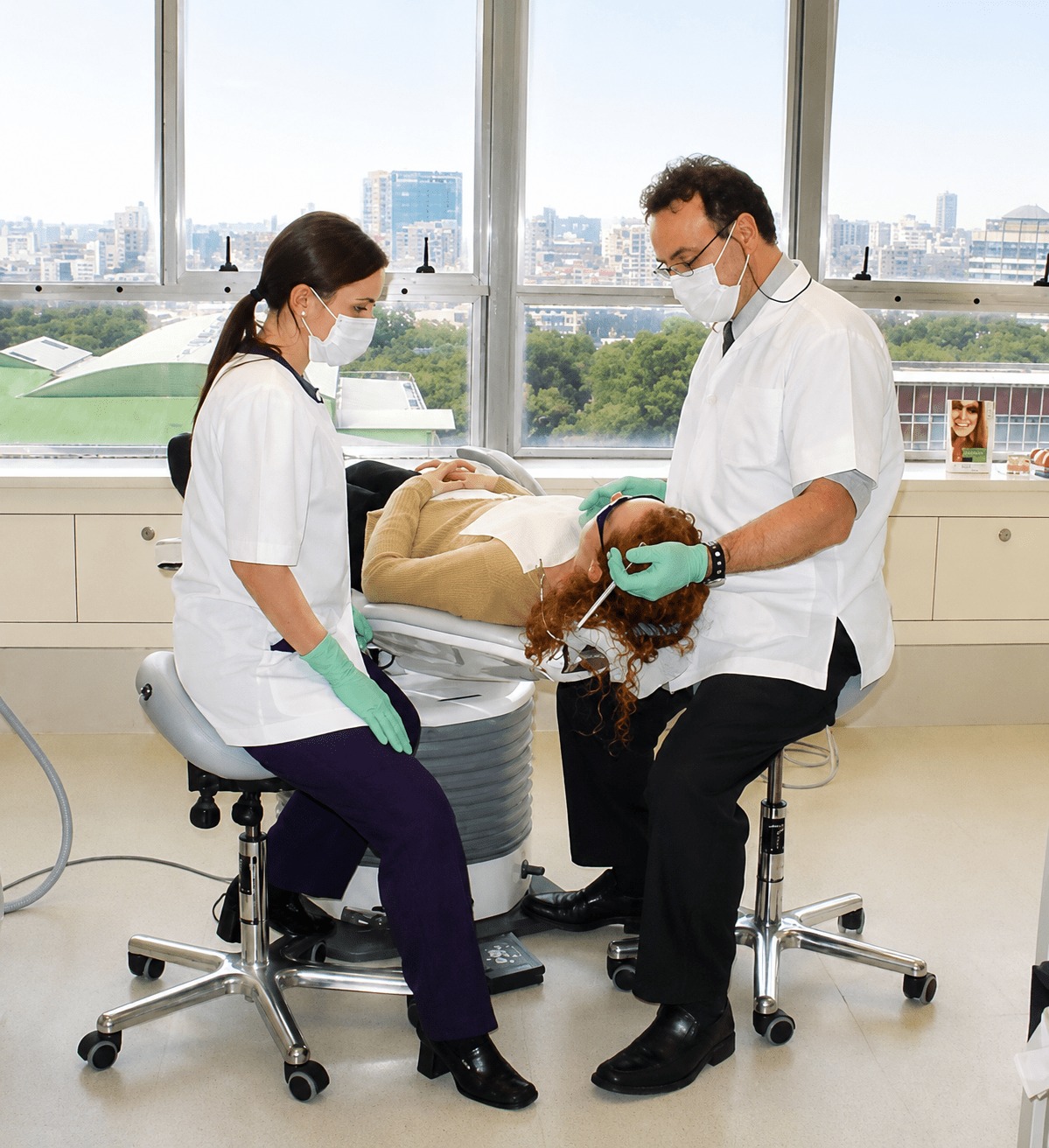 Physiotherapist treating patient on Bambach seat